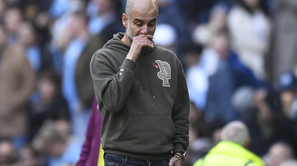 Manchester City's Spanish manager Pep Guardiola gestures on the touchline during the Premier League match against Brentford at the Etihad Stadium in Manchester on November 12, 2022. (Photo by Oli SCARFF / AFP)