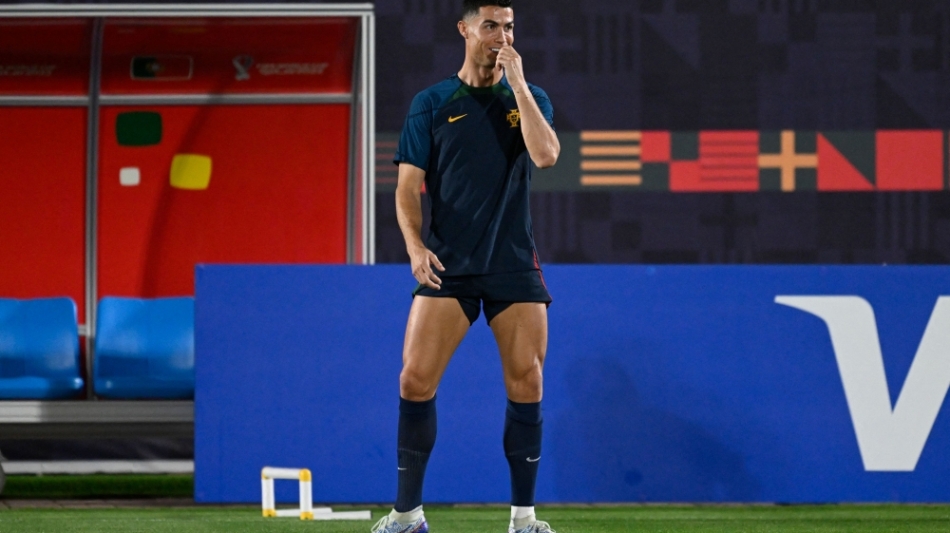 Cristiano Ronaldo attends a training session at the Al Shahaniya SC training site, northwest of Doha on December 5, 2022. (Photo by PATRICIA DE MELO MOREIRA / AFP)