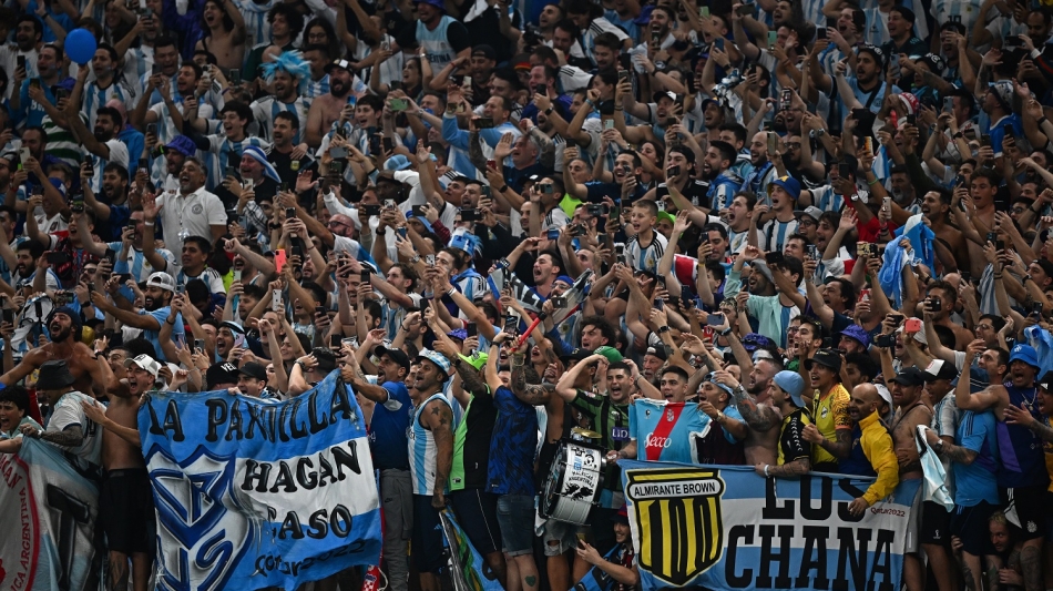 Argentina fans celebrate their semifinal win over Croatia: AFP/Anne-Christine Poujoulat