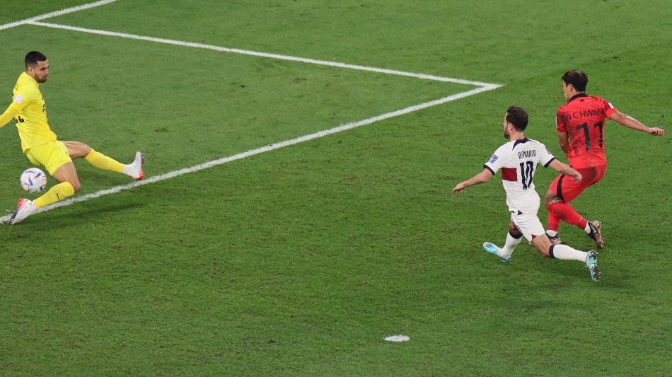 South Korea’s Hwang Hee-Chan scores their winner against Portugal: AFP/Jack Guez