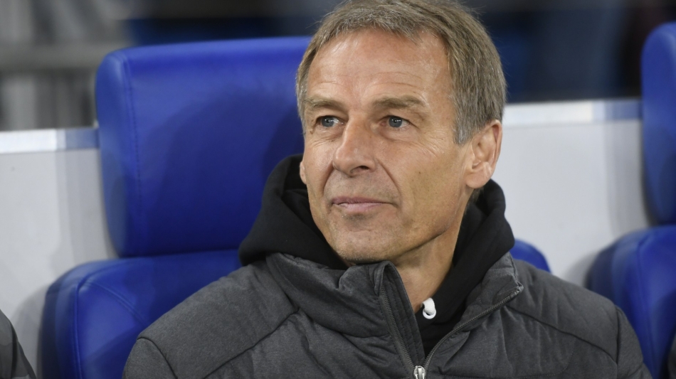 Hertha Berlin's German head coach Jurgen Klinsmann sits on the bench during the German Cup (DFB Pokal) round of 16 match against Schalke 04 in Gelsenkirchen, westen Germany on February 4, 2020. File Photo/ AFP