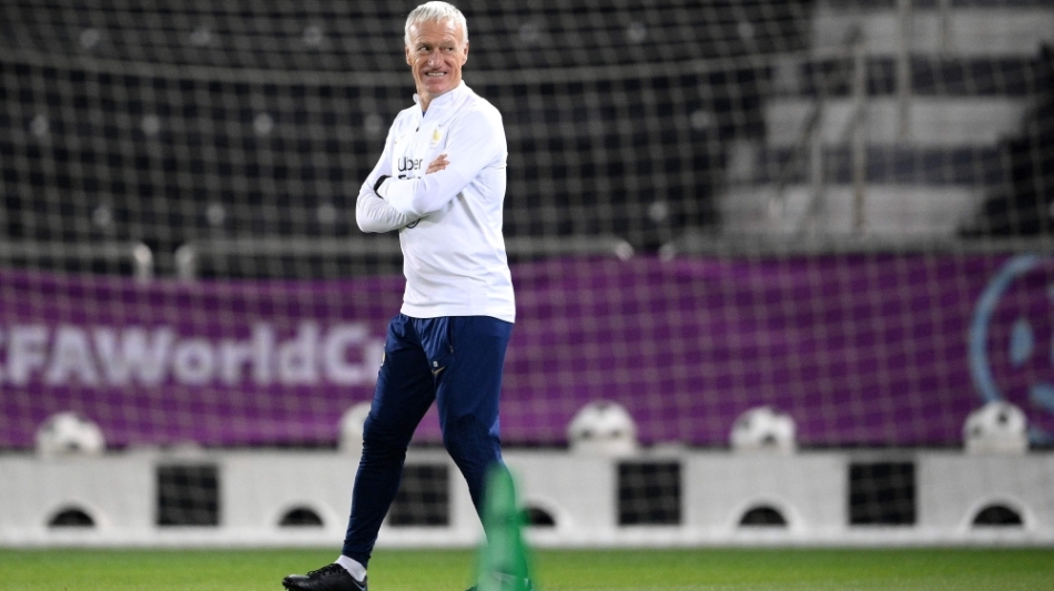 France's coach Didier Deschamps looks on during a FIFA World Cup Qatar 2022 training session at the Al Sadd SC training centre in Doha on December 16, 2022. (Photo by FRANCK FIFE / AFP)