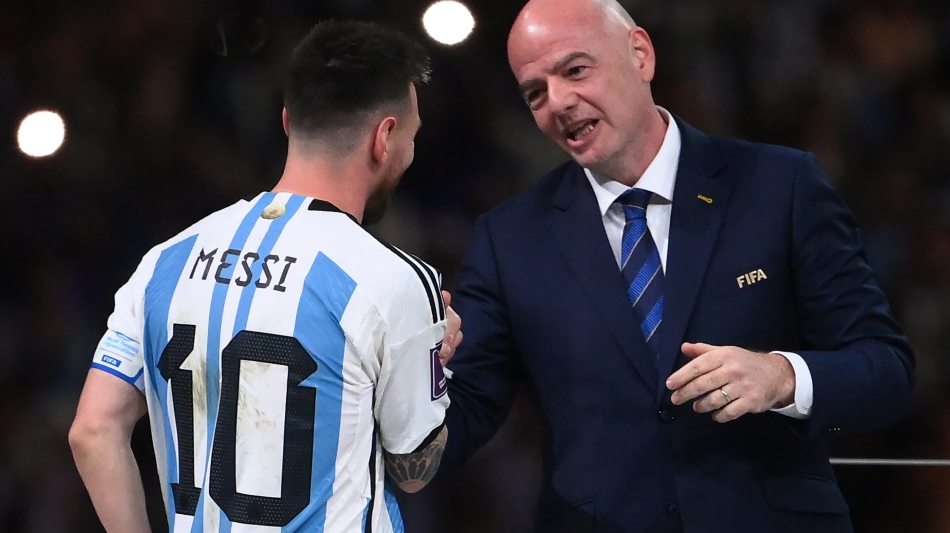 FIFA President Gianni Infantino greets Argentina’s star Lionel Messi: AFP/Franck Fife