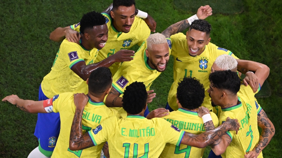 Brazil players celebrate after Neymar, centre, scored against South Korea: AFP/Kirill Kudryavtsev