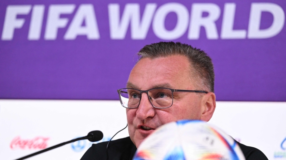 Poland's coach Czeslaw Michniewicz gives a press conference at the Qatar National Convention Center (QNCC) in Doha on December 3, 2022. (Photo by ANDREJ ISAKOVIC / AFP)