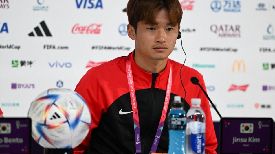 South Korea's defender Kim Jin-su attends a press conference at the Qatar National Convention Center (QNCC) in Doha on December 4, 2022. (Photo by Pablo PORCIUNCULA / AFP)