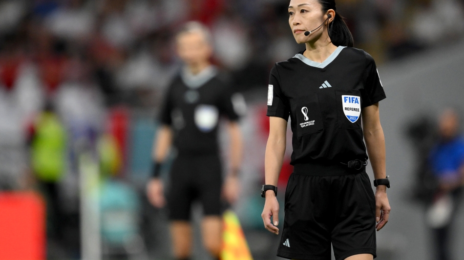 Japanese fourth official Yoshimi Yamashita looks on during the match between Wales and England on November 29: AFP/Nicolas Tucat
