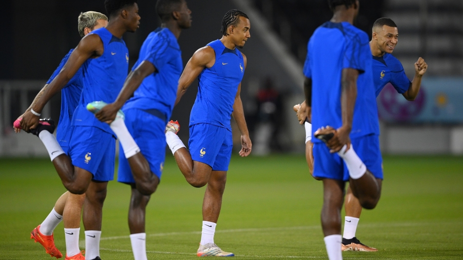 France players take part in a training session ahead of their quarterfinal against England: AFP/Franck Fife