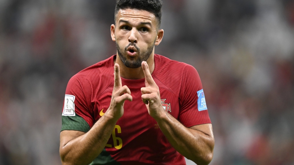Portugal's Goncalo Ramos celebrates scoring his team's first goal during the Qatar 2022 World Cup round of 16 match against Switzerland at Lusail Stadium in Lusail on December 6, 2022. (Photo by PATRICIA DE MELO MOREIRA / AFP)