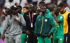 لاعبو منتخب السنغال ومدربهم