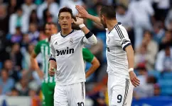 أوزيل وبنزيما