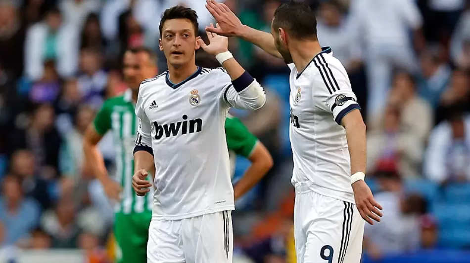 أوزيل وبنزيما