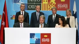 أردوغان خلال توقيع طلب فنلندا