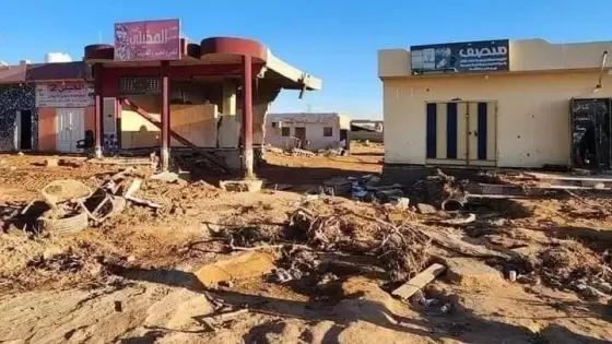 آثار الدمار التي خلفها الفيضان في قرية النخيلي