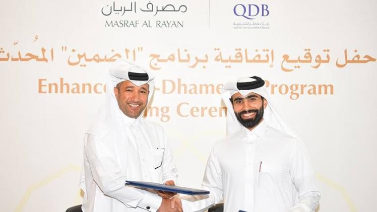 من حفل توقيع إتفاقية برنامج الضمين المحدث