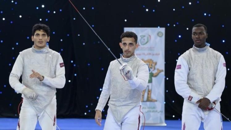 المنتخب القطري المكون من الثلاثي علي العذبة وعبدالله خليفة وخالد اليافعي