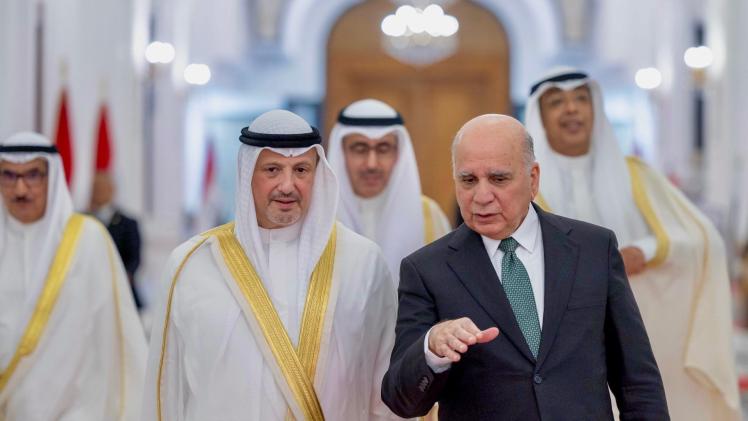 وزير الخارجية العراقي ونظيره الكويتي