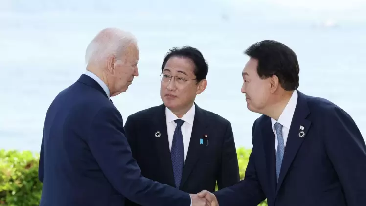 بايدن وسيوك يول