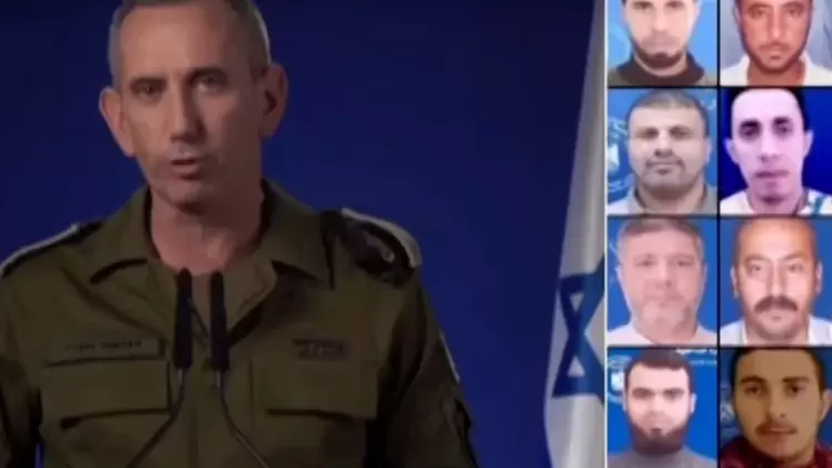 المتحدث الإسرائيلي أثناء عرض صور لفلسطينيين اعتقلوا داخل مجمع الشفاء