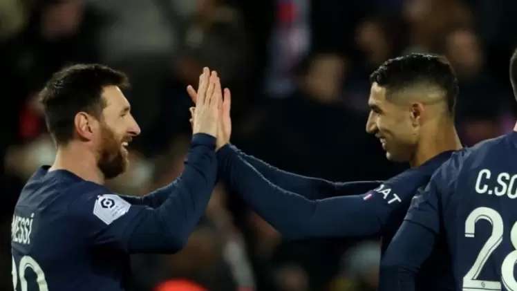 أشرف حكيمي وليونيل ميسي