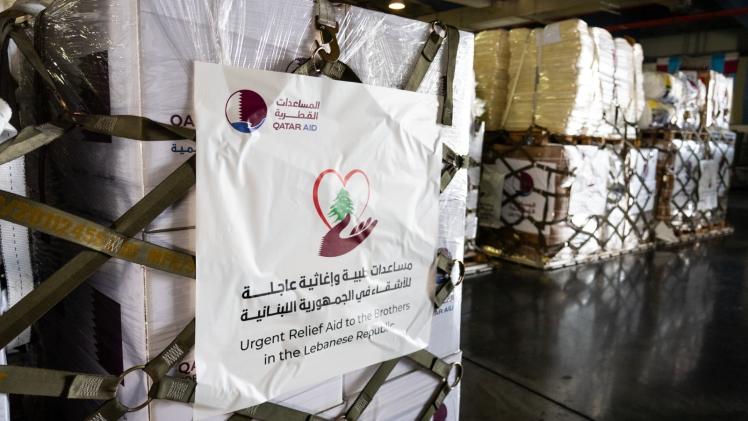 جانب من تسليم المساعدات