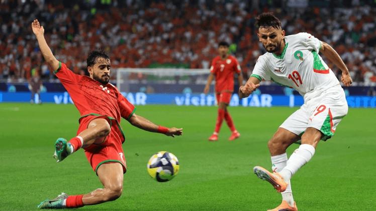 لقطة من مباراة المغرب وعمان